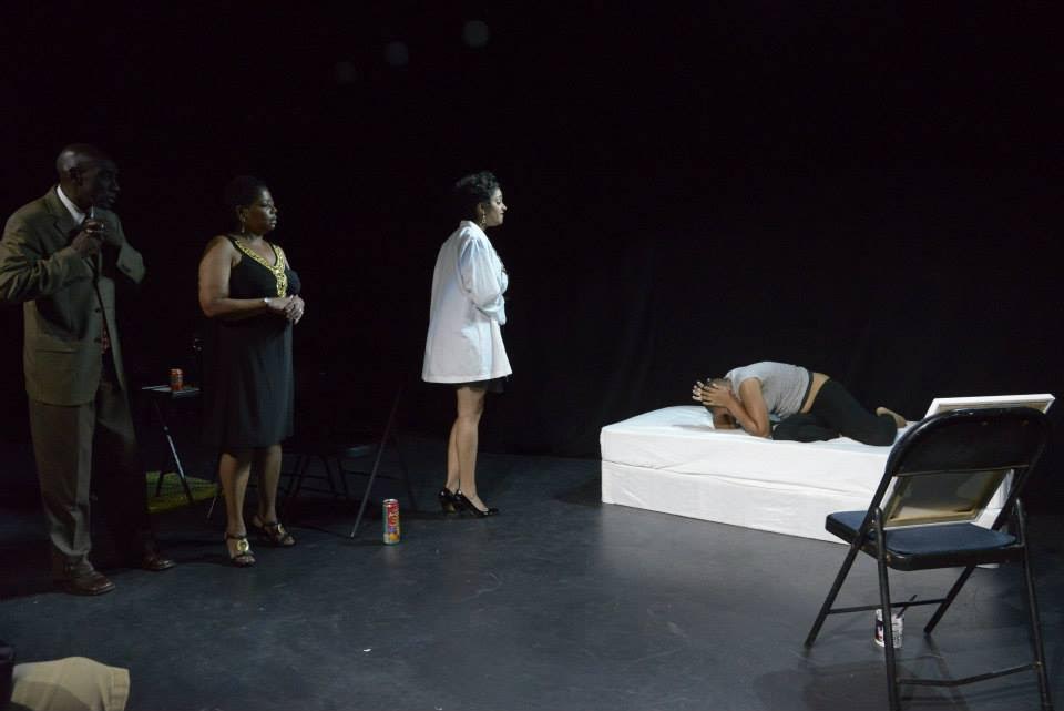  The first scene of the play when Morgan wakes up in the St. Elizabeth's Psychiatric Hospital, confronted by her doctor and parents.